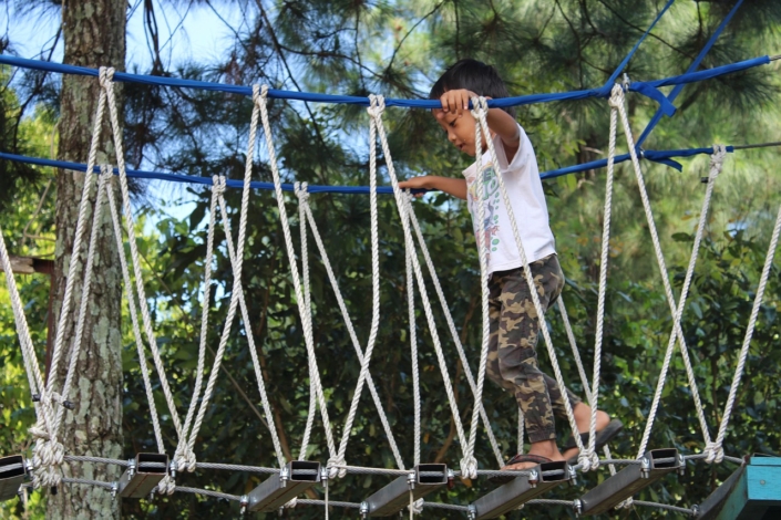 child crossing bridge